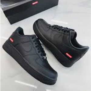 Black Sneakers with Red Accents